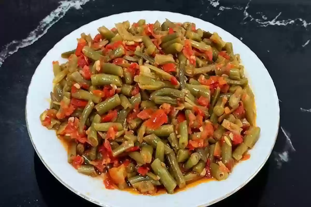 طريقة عمل الفاصوليا الخضراء السورية بالزيت والبندورة